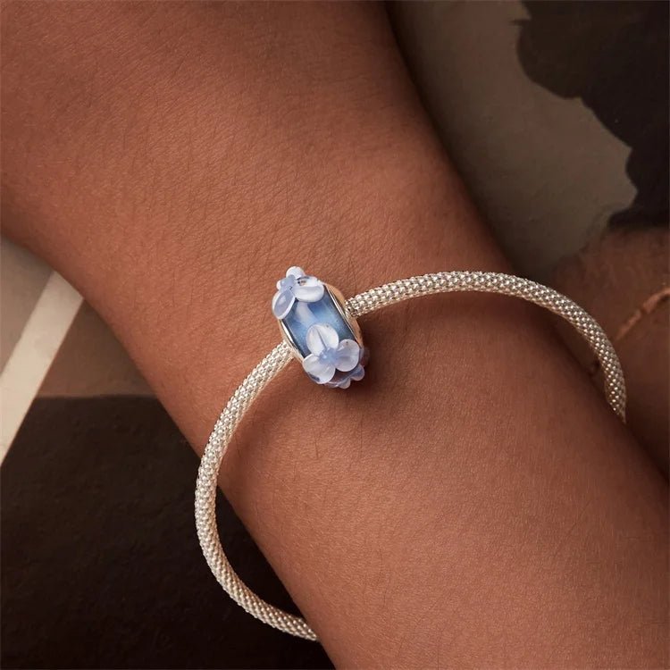 Pangama Jewelry Blue Murano Glass with Raised Floral Accents Charm