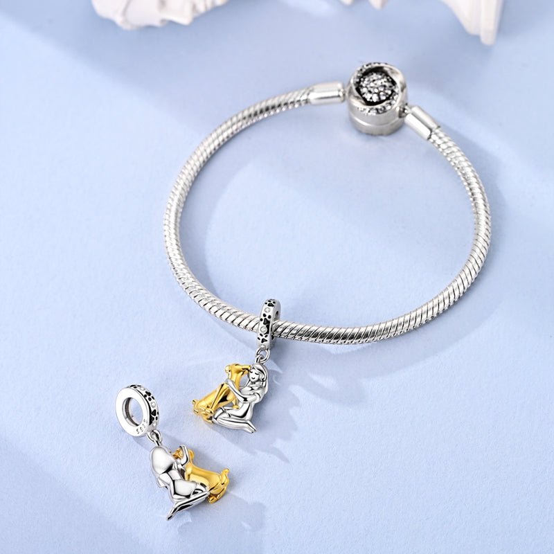 Pangama Jewelry Girl Hugging Dog Dangle Charm