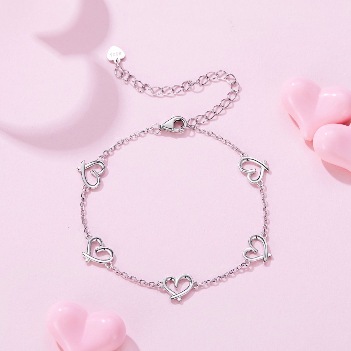 Pangama Jewelry Linked Hearts Silver Bracelet