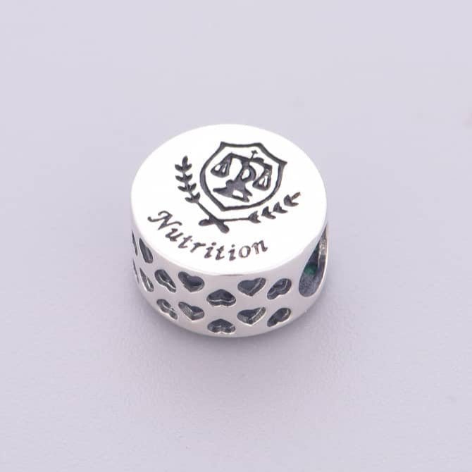 Pangama Jewelry Nutrition Symbol with Green Crystals Charm