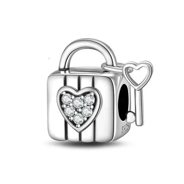 Pangama Jewelry Padlock & Heart Key Charm