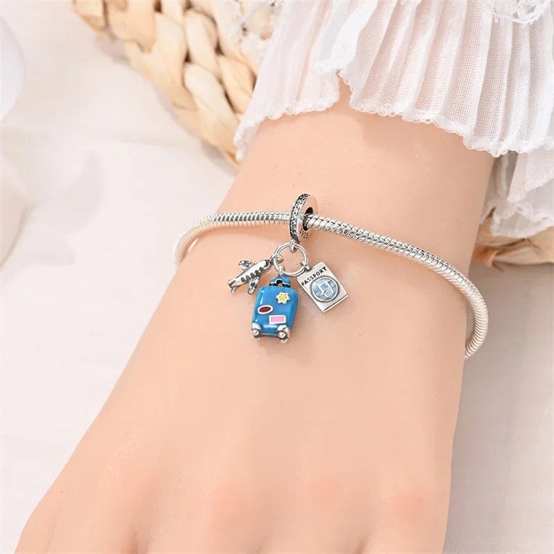 Pangama Jewelry Plane, Passport and Blue Suitcase Triple Dangle Charm