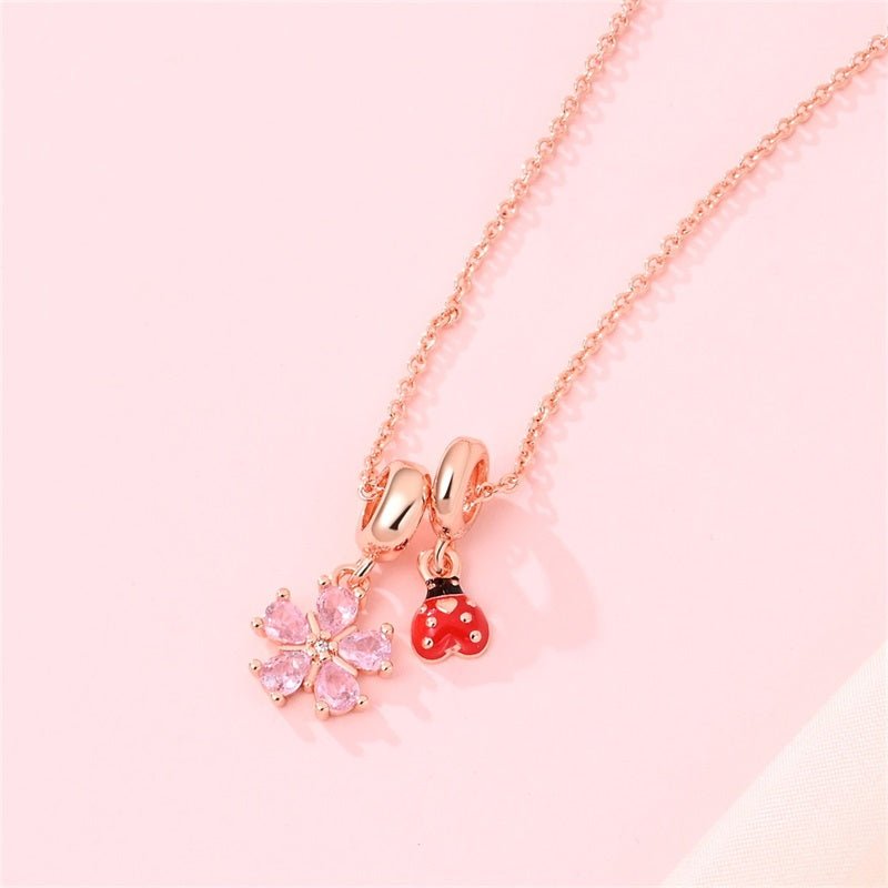 Pangama Jewelry Rose Gold Flower & Ladybug Necklace