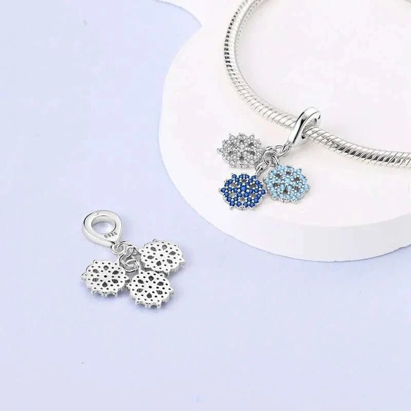 Pangama Jewelry Triple Snowflake Charm with Sparkling Blue and White Crystals