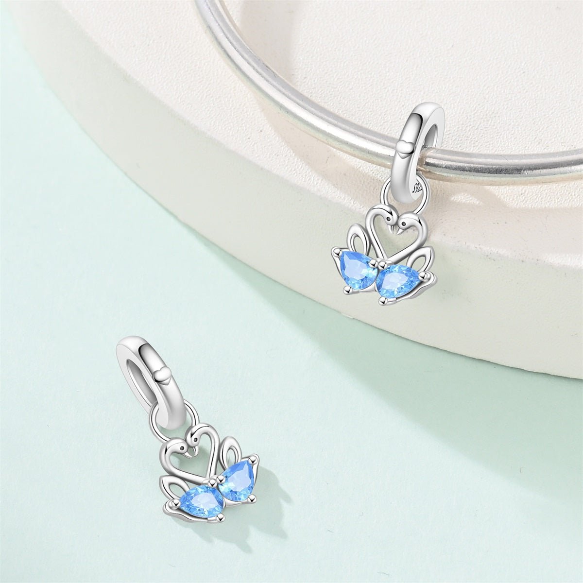 Pangama Jewelry Two Swans with Blue Heart Crystals Dangle Charm