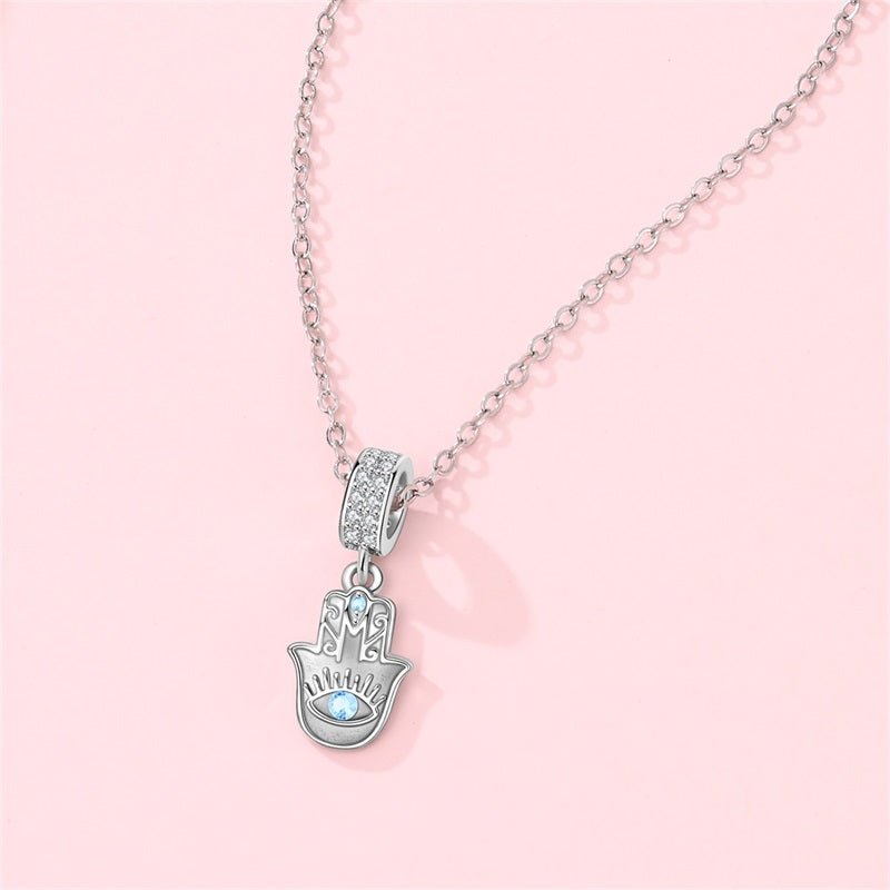 Pangama Jewelry Blue Stone Hamsa Hand Necklace