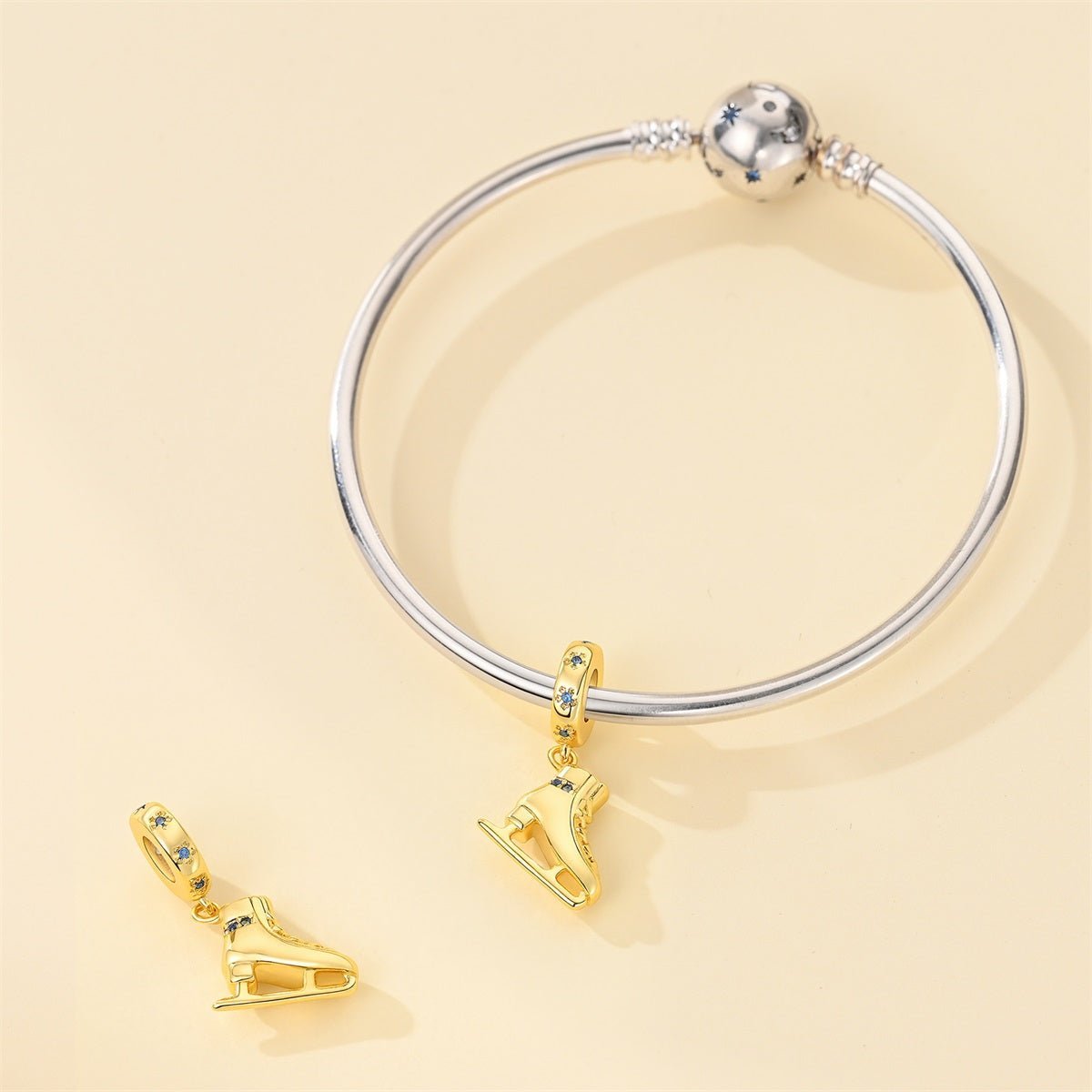Pangama Jewelry Golden Ice Skate with Blue Crystal Dangle Charm