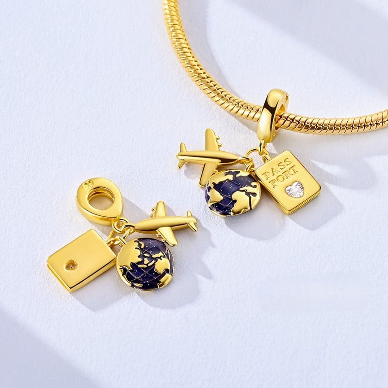 Pangama Jewelry Golden Passport, Globe & Airplane Triple Dangle Charm