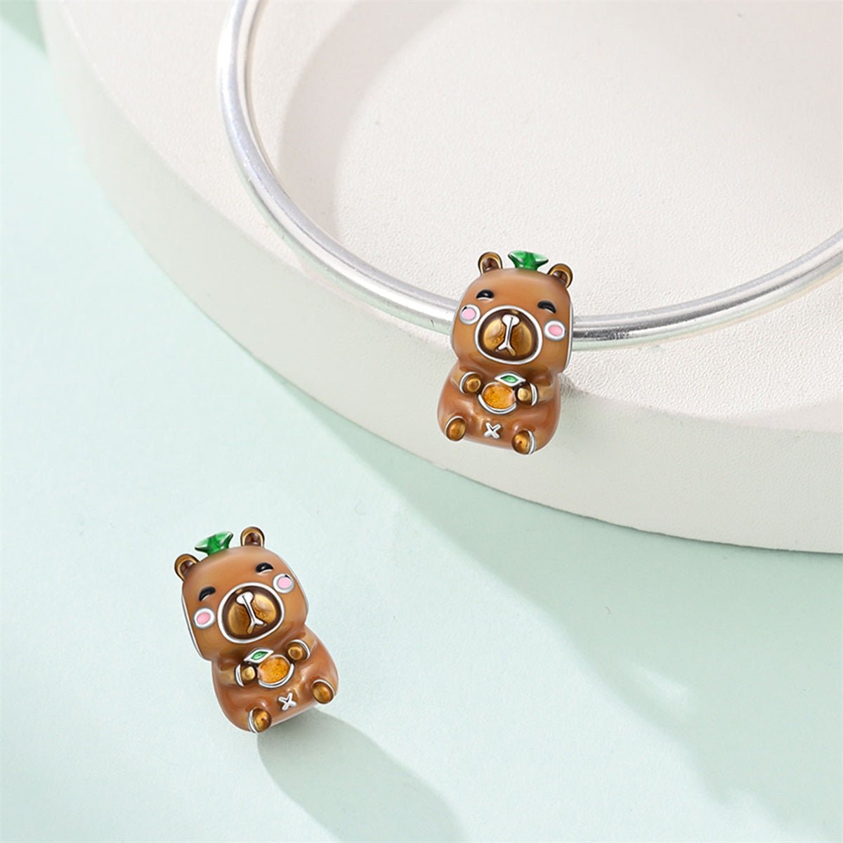 Pangama Jewelry Lucky Capybara with Tangerine Charm