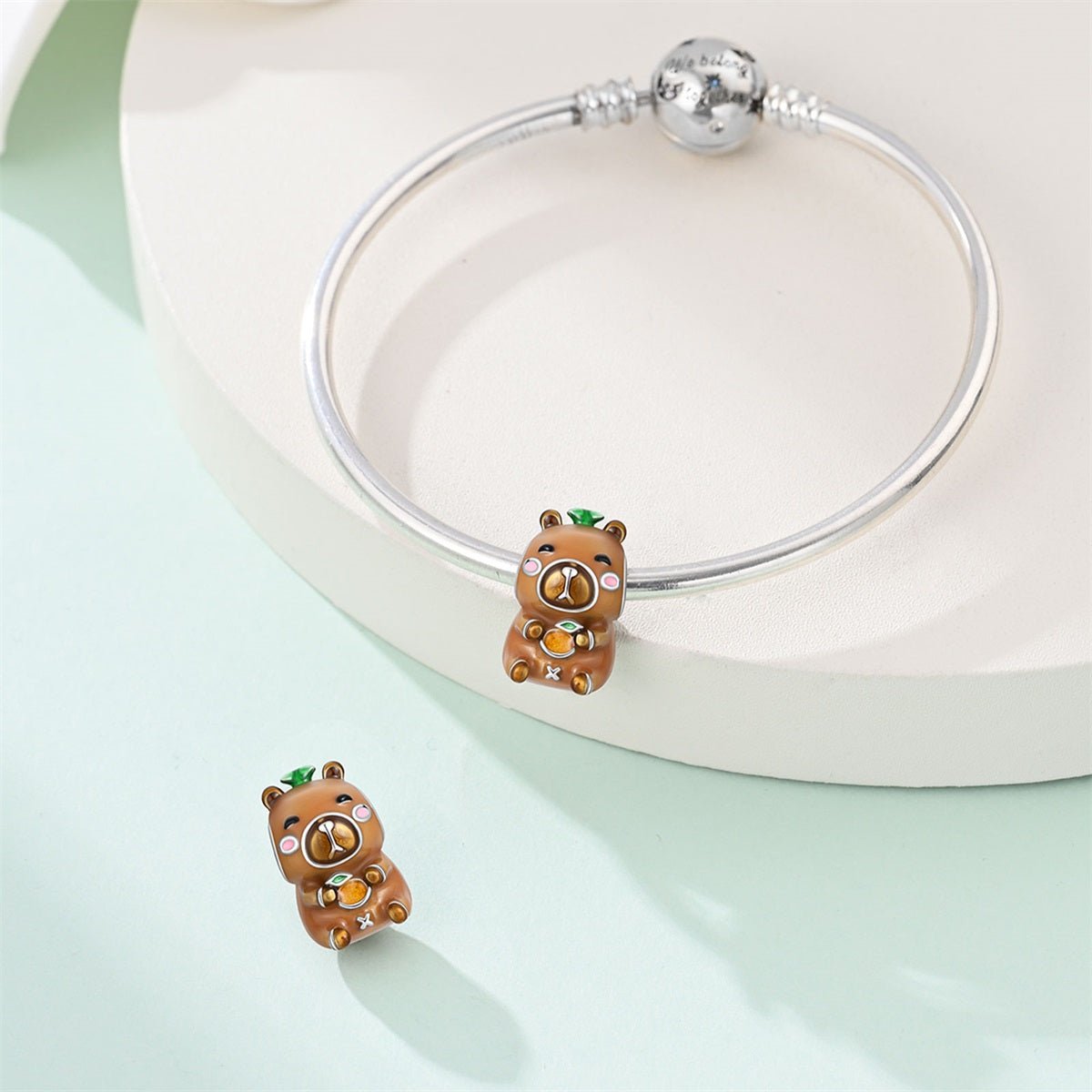 Pangama Jewelry Lucky Capybara with Tangerine Charm
