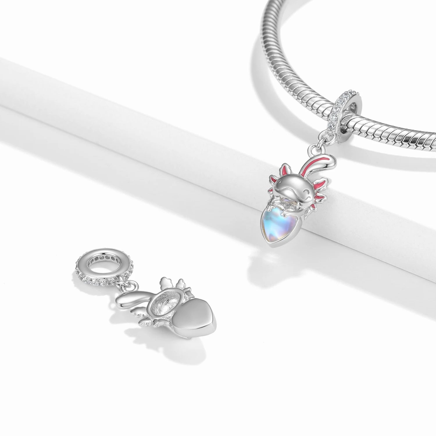 Pangama Jewelry Charm Axolotl Holding a Shimmering Heart Charm