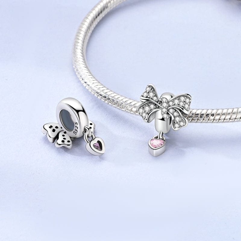 Pangama Jewelry Charm Sparkling Bow with Pink Heart Charm