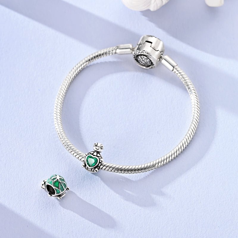 Pangama Jewelry Smiling Turtle with Green Heart Charm